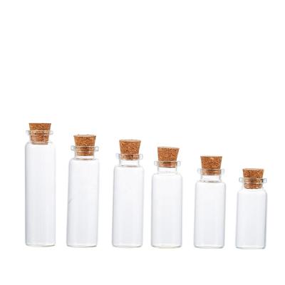 China Wholesale Customized Personal Care 5ml 6ml 7ml 8ml 10ml 15ml Small Round Clear Glass Cosmetic Bottle With Cork for sale