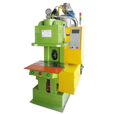 China VERTICAL Vertical Clamping Injection Molding Machine Horizontal Insert Molding Powerful Molding Machine For Making Computer Loader for sale