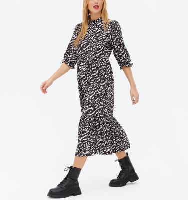 China Anti-wrinkle Black Animal Print Frill Neck High Midi Dress for sale