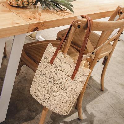 China Fashion 2020 Summer Fashion Lady Hollow Beach Lace Embroidered Tote Bag for sale