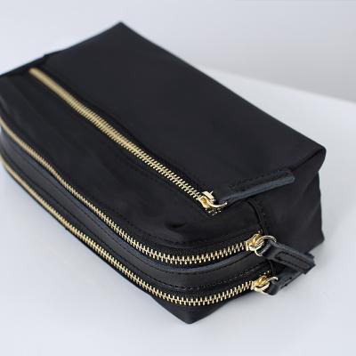 China High Quality Large Capacity Black Travel Pouch Small Zipper Cosmetic Make Up Bag for sale