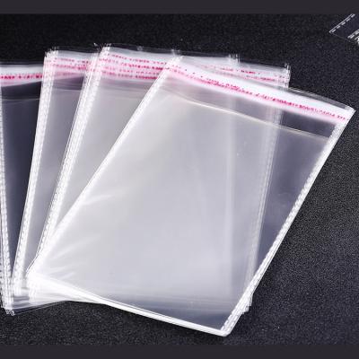 China Recyclable Wedding Clothes Large Clear Cellophane Bulk Reusable Small Business Self Adhesive Plastic Bag for sale