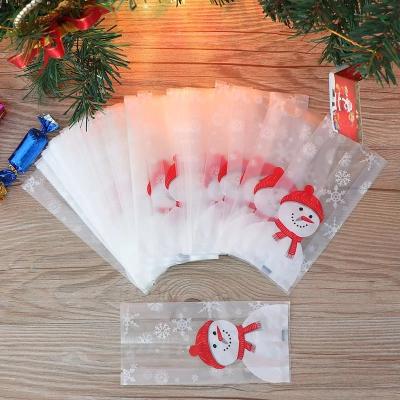 China Recyclable Merry Christmas Gifts Bags Baking Packaging Christmas Santa Claus Snowman Snack Candy Bag Cartoon Bags for sale