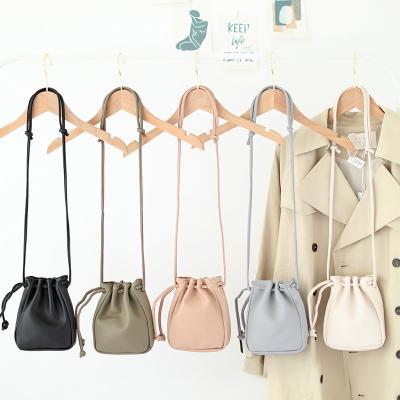 China Hot Selling Designer Water Proof Mini Drawstring Clips Luxury Korea Style Lady Mobile Phone Bag Lipstick Bag Ladies Purses for sale