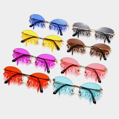 China ZHIHENG 2022 Fashion Sunglasses Fire Glass Women PC Frame Color Drip Transparent Sunglasses for sale