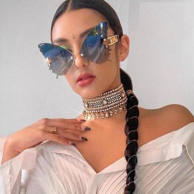 China Fashion Sunglasses 2021 New Arrivals Big Butterfly Shaped Sunglasses Metal Frame Rimless Shades Party Colored Sun Glasses for sale