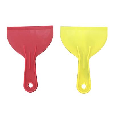 China Flexible Blade Economic ABS Yellow Orange Plastic Scraper Putty Knife for sale