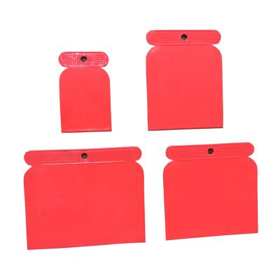 China Flexible Blade 4 Pcs Set Red Plastic ABS Putty Knife Scraper for sale