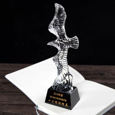 China Europe Customized Large Decorative Eagle Hawk Wing Crystal Trophies Engraved Logo Award For Business Gift for sale