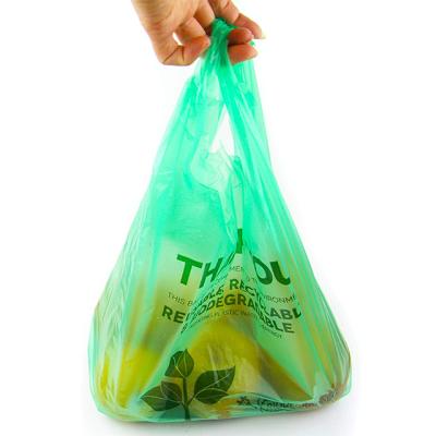 China BIODEGRADABLE T-shirt Shopping Bag 100% Compostable Plastic Biodegradable Heat Seal Cornstarch Gravnre Printing Accept Customized Logo for sale