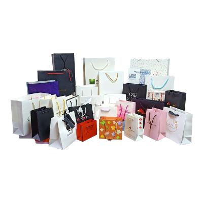 China Factory Wholesale Craft Paper Bag Recyclable With Logo Gift Bags Paper Bags Eco-friendly Paper Packaging for sale