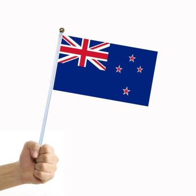 China Hotel and Resort Hot Sales Customized Logo Hand Held Waving Mini Pole Flag New Zealand Hand Flag for sale