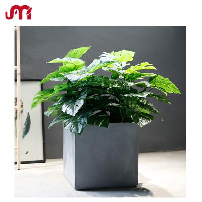 China Contemporary Plastic Monstera Small Tree Artificial Bonsai Plant With Cement 43x43x43cm Pot for sale