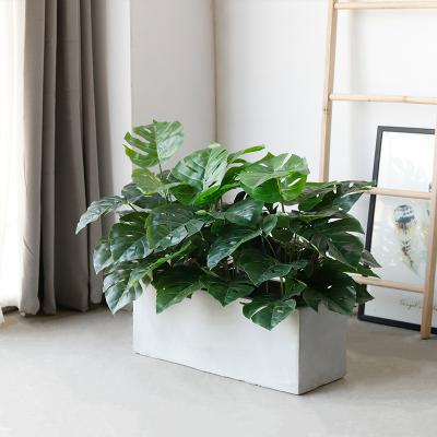 China Contemporary Artificial Green Plant With Cement 62x25x25cm Pot Monstera Tree for sale