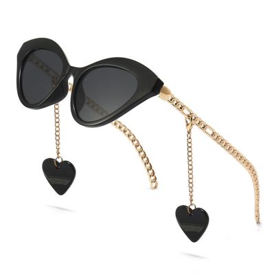 China Fashion sunglasses 2021 0978 new retro heart small frame cat eye sunglasses narrow lens sunshades for sale