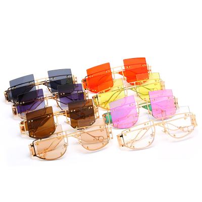 China High quality luxury frameless luxury half stream sunglasses metal rivet rivet punk sun glasses fashion sunglasses for sale