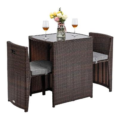 China Modern Outdoor Furniture Patio Rattan Wicker Bistro Set With Glass Top Table Cushioned Chairs, Patio Convention Set Dining Table Set for sale