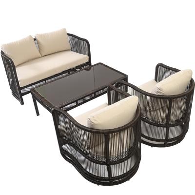 China Modern Outdoor Furniture Rattan Table Sofa Garden Furniture Armchair Luxury Wicker And Patio Rattan Chairs Sofa Set 4 Seater With Table for sale