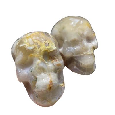 China China Wholesale Natural Healing Crystal Pink Cherry Agate Crystal Carvings Skulls For Gift for sale