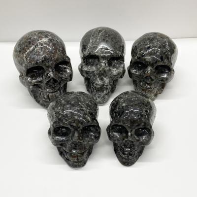 China China Wholesale Natural Flame Stone Hand Carved Quartz Crystal Skulls For Decoration Skulls Gemstone Healing for sale