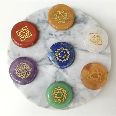 China Europe Gemstone Seven Chakra Reiki Healing Crystal with Symbols Palm Stones Engraved Holistic Balancing Polished Set for sale