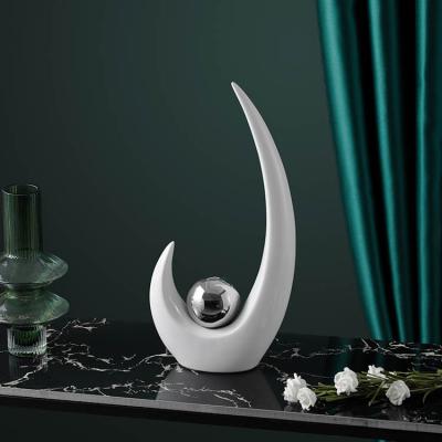 China Hot Selling Art Decor Wholesale Unique White Silver Ceramic Ball Shape Desk Decor Cheap Modern Home Decoration for sale