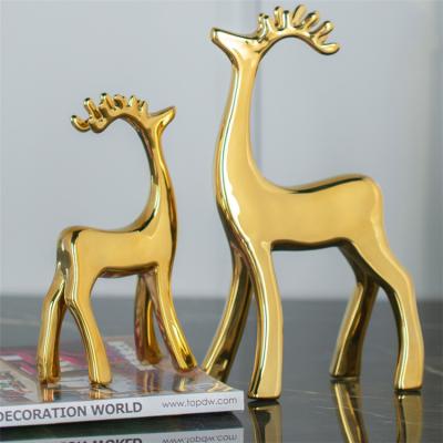 China Art Decor Exquisite Deer Design New Shape Office Decor Shiny Gold Ceramic Piece Home Decoration For Home for sale