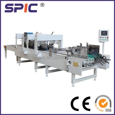 China Automatic Beverage Double Side Adhesive Tape Sticking Machine for sale