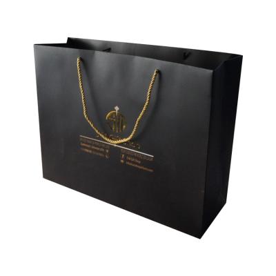 China Recycled Materials Printing Custom Shopping Paper Bags With Your Own Logo for sale