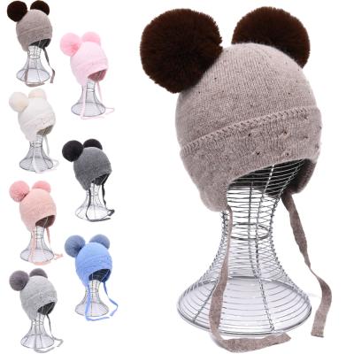 China JOINT Cute Kids Beanie Sparkle With Beanie Earflap Knit Double Pompom Logo Kids Beanies Custom Hat Faux Fur for sale