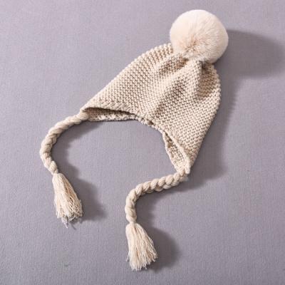 China COMMON Children's Ear Muff Caps With Sides Beanie Soft Pompom Kids Wholesale Cheap Kids Ear Muff Caps for sale