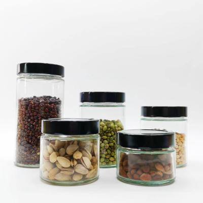 China Wholesale 180/280/380/500/750ml Food Round Customize Glass Food Jars With Metal Lid for sale