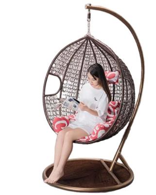 China Good Quality Modern Rattan Shaped Round Frame Rattan Egg Chair Adult Hanging Patio Swings With Metal Stand for sale