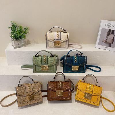 China PU The New Fashion Handbags 2023 Young Lady Rivet Bags Ladies Fashion Design Purses For Woman for sale