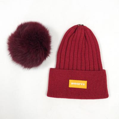 China COMMON High Quality Women's Solid Color Knit Acrylic Beanie Hat With Ball On Top Logo Beanie Hat Custom Made Winter Hat for sale