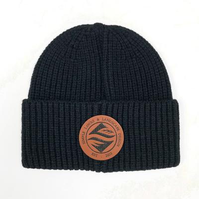 China COMMON Wholesale Unisex Solid Color Knitted Winter Covers Custom Logo Warm Hats Patch Acrylic Winter Beanie for sale