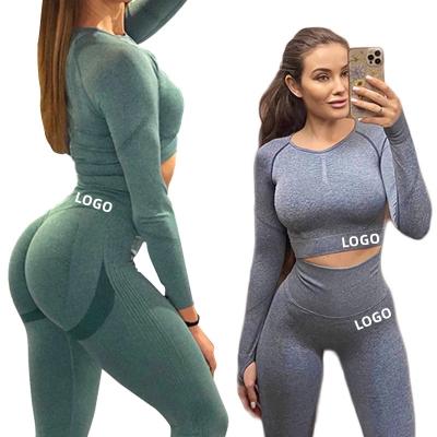 China RTS Breathable Seamless Yoga Sets Moisture Hip Lifting High Waist Fitness Pants Women's Tight Long Sleeve Sports Suit for sale