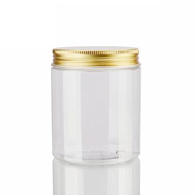 China BEAUTY PACKAGING Cookies Container Empty Wide Mouth 250g Plastic Clear Empty Cosmetic Jars With Gold Aluminum Lid for sale