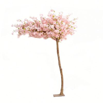 China Eco-friendly Materials 2.5m Pink Wedding Centerpiece Arched Artificial Cherry Blossom Tree Arch for sale