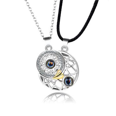 China 2Pcs Sun Moon Shape Couple Necklaces 100 Languages ​​Environmental Friendly Magnetic Projection Pendant Necklace I Love You For Women Men for sale