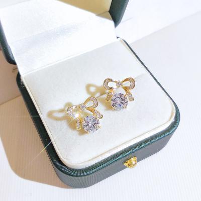 China Real Gold Plating Fashion Sterling Silver Post Inlaid Diamond Stud Earring Lead Free Nickel Free Mirco Pave CZ Bowtie Earring for sale