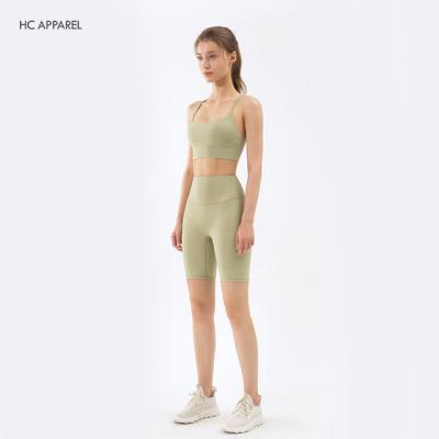 China Women yoga sports breathable sweat hygroscopic release short set bra and ribbed yoga legging set for sale for sale