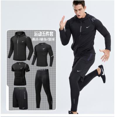 China Gym Sports Quick Drying Tights Breathable Men's Fitness Clothing Suit Five Piece Basketball Training Running Suit for sale