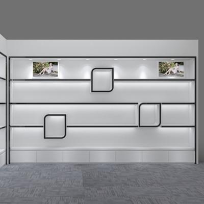 Cina wall fixture display shelves for chain garment shop new design clothing retail shop with shelve LED light under shelves in vendita