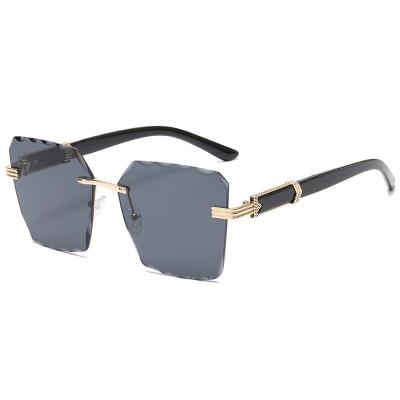 China Rimless Trendy Rimless Sunglasses 2023 Women Sun Glasses Metal Sun Glasses Vintage Square Custom Made High Quality Sun Glasses New for sale