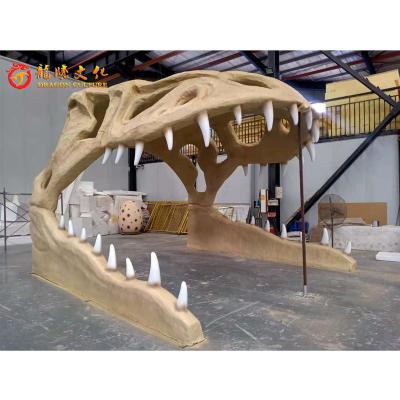 China Decorative Fiberglass Dinosaur Fossil Gate Kids Playground Theme Park Entrance Gate For Indoor Or Outdoor for sale