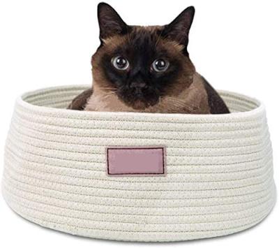 China Cute Cotton Pet Fun Room Viable Rope Woven Interlocking Rest Cat Bed Storage Baskets Nest Round Sleep Warm Medium Bed for sale