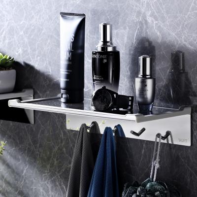 China Wall Mounted Type Stainless Steel Self Adhesive Towel Rack Bathroom Shelf Organizer Toilet Storage Bath Cart with Towel Hooks for sale