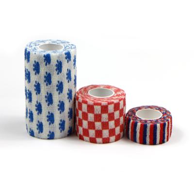 China Highly Elastic Plaid Self Adhesive Cohesive Elastic Conforming Compression Bandage for sale