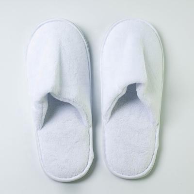 China Luxury Travel Comfort Coral Fleece Disposable Slippers Home Hotel Spa Airline Hotel Slippers For Hotels for sale